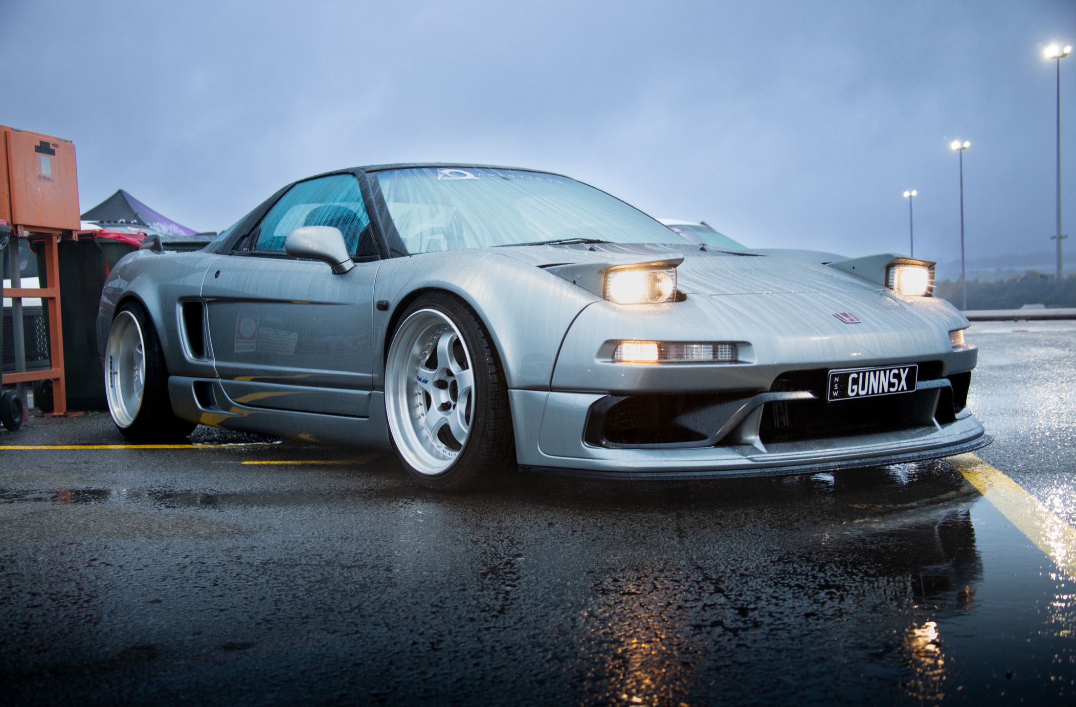 Widebody Honda NSX in the wet at dusk, Manly